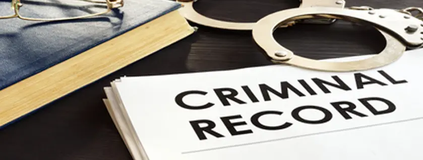 criminal record and handcuffs